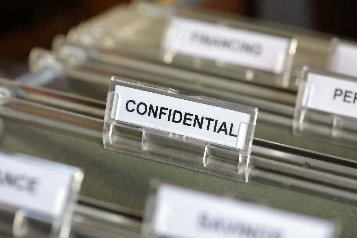 Image of a file that reads "Confidnetial"